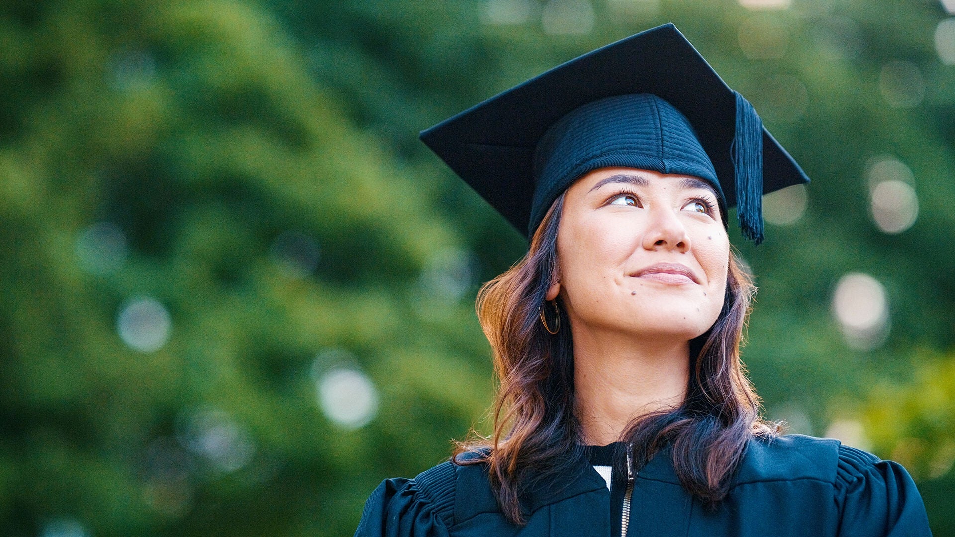 University student, woman and outdoor for graduation with memory, smile or thinking or achievement at campus. Girl, Japanese person and graduate with memory, decision or choice for future at college