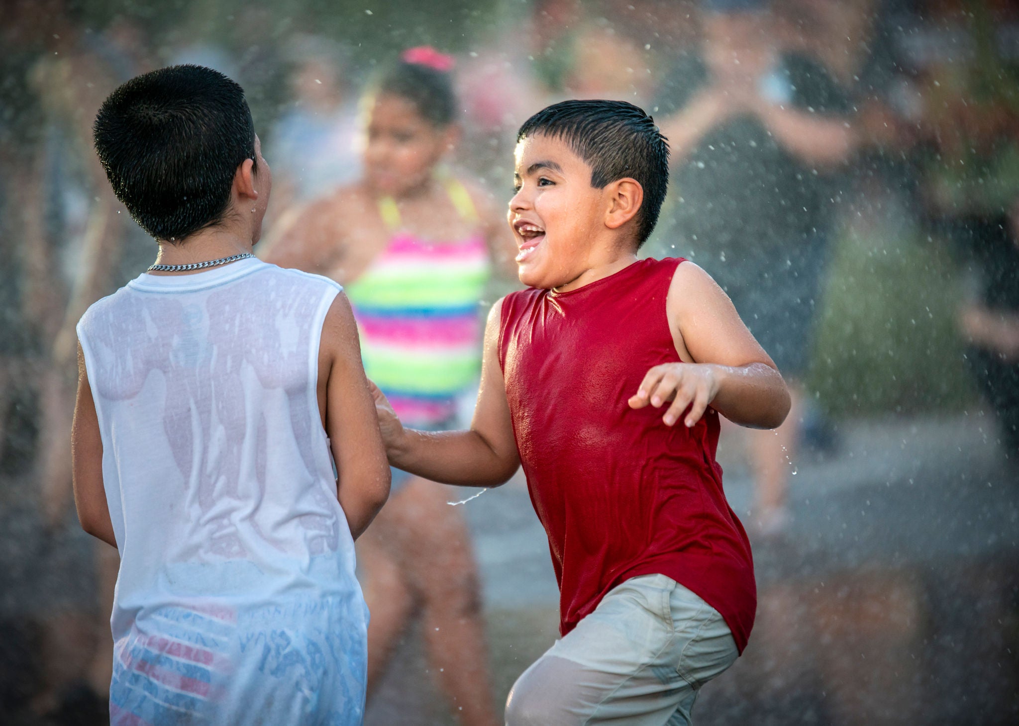 kid walking in water 