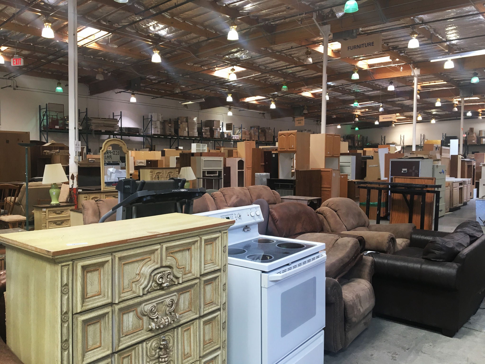 Various furniture items on the floor of the Stardust warehouse