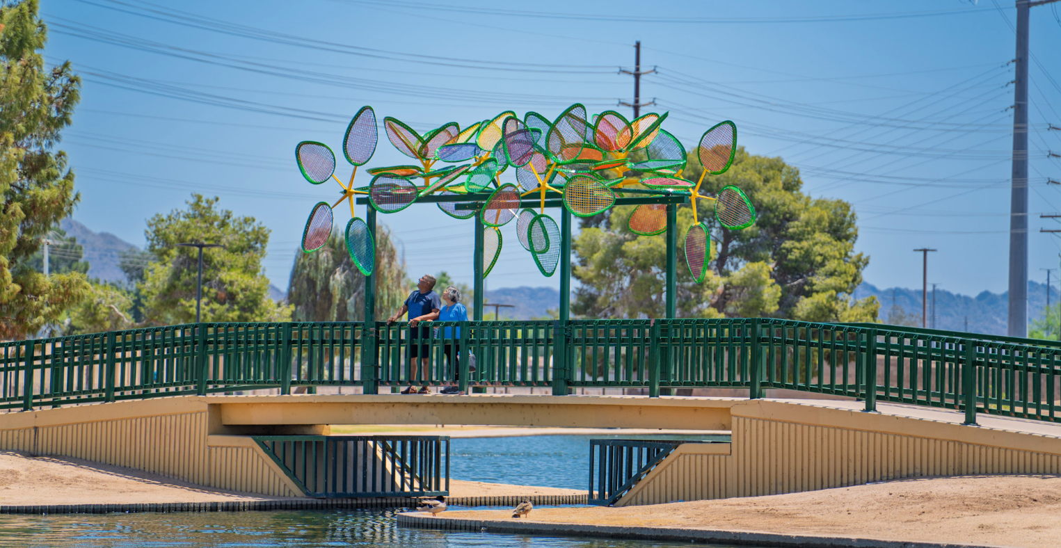 Sombra art project at Cortez Park with Pedestrians Crossing the Bridget.
