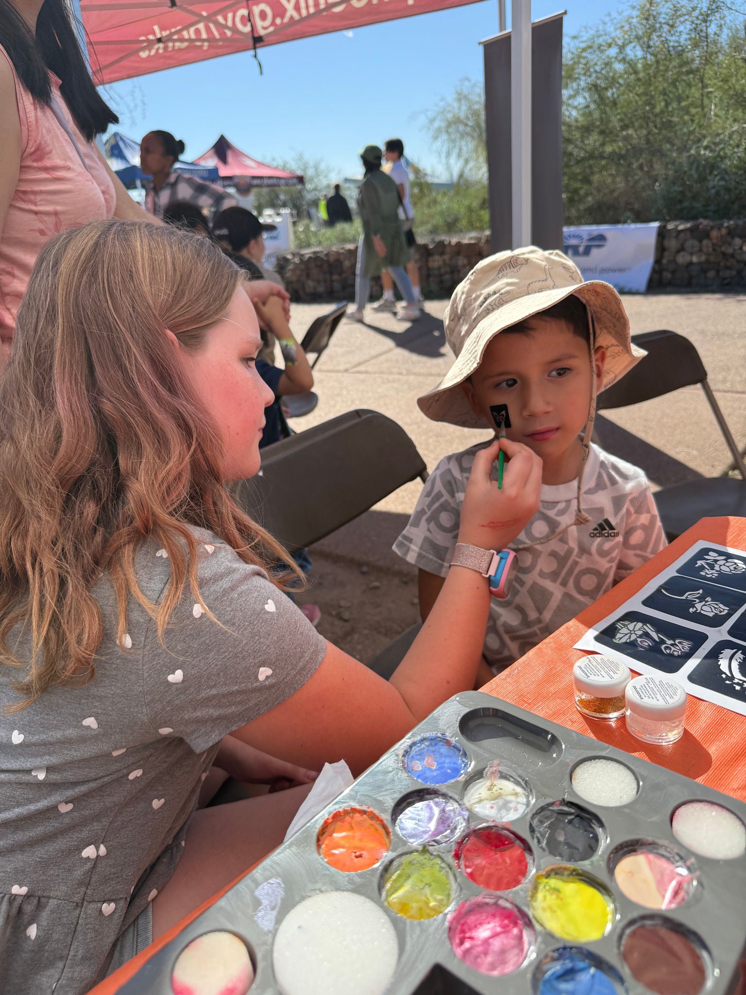 child getting thier face painted