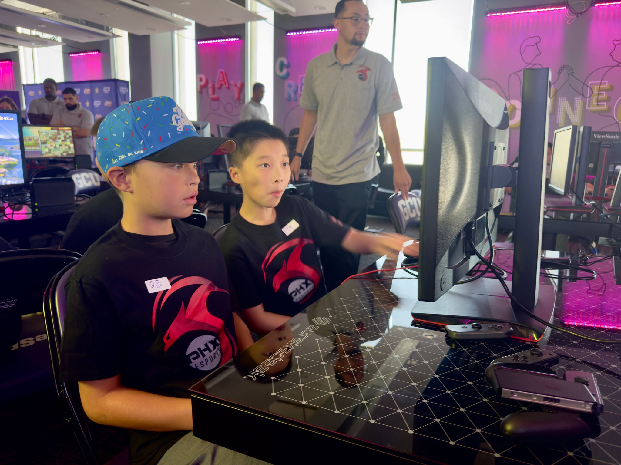 Children playing video games.