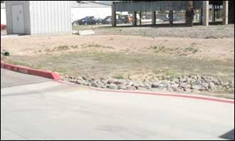 Clean and well maintained on-site retention basin.