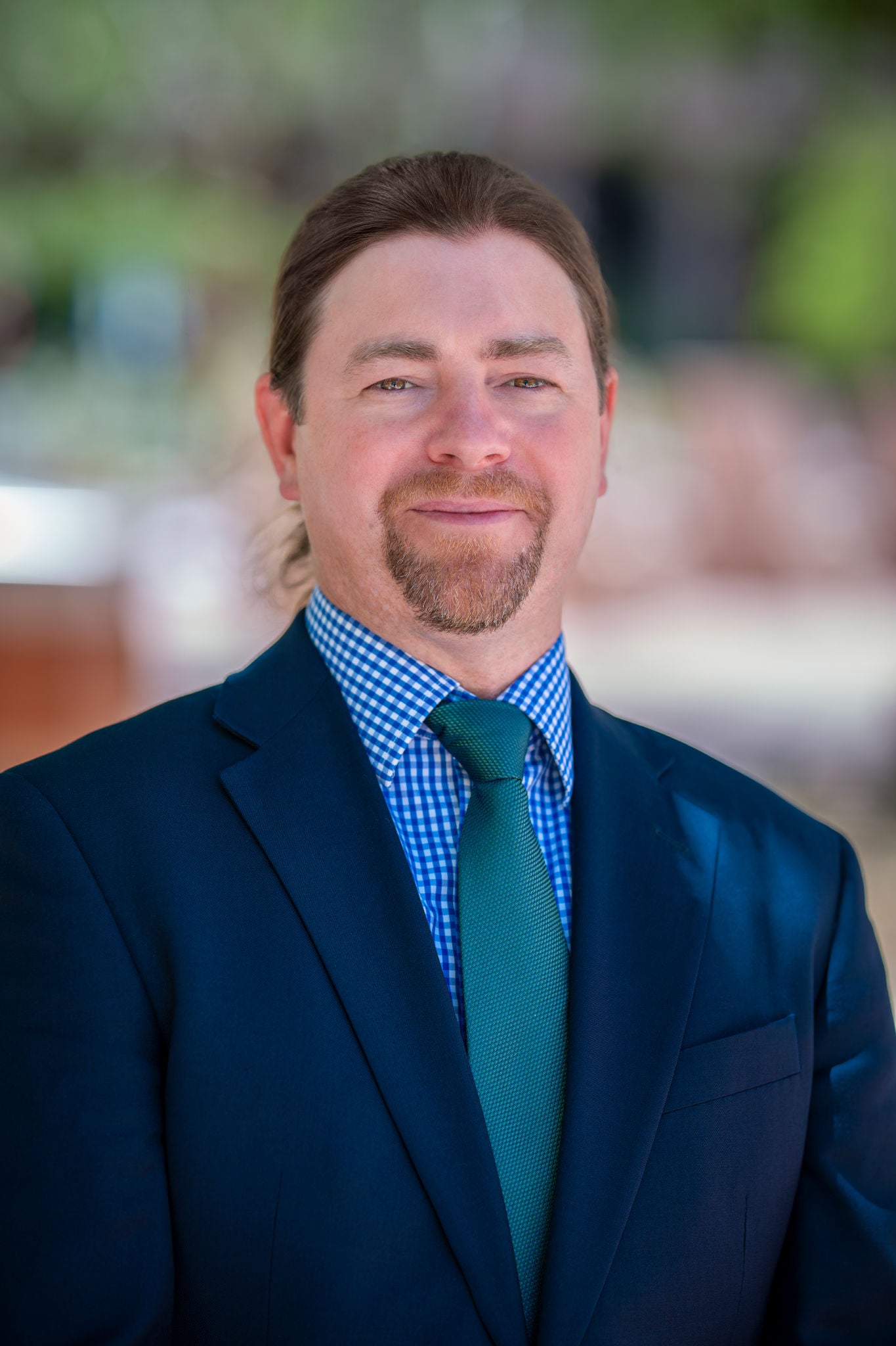 <p>Headshot of Sam McAllen, an Assistant Director</p>