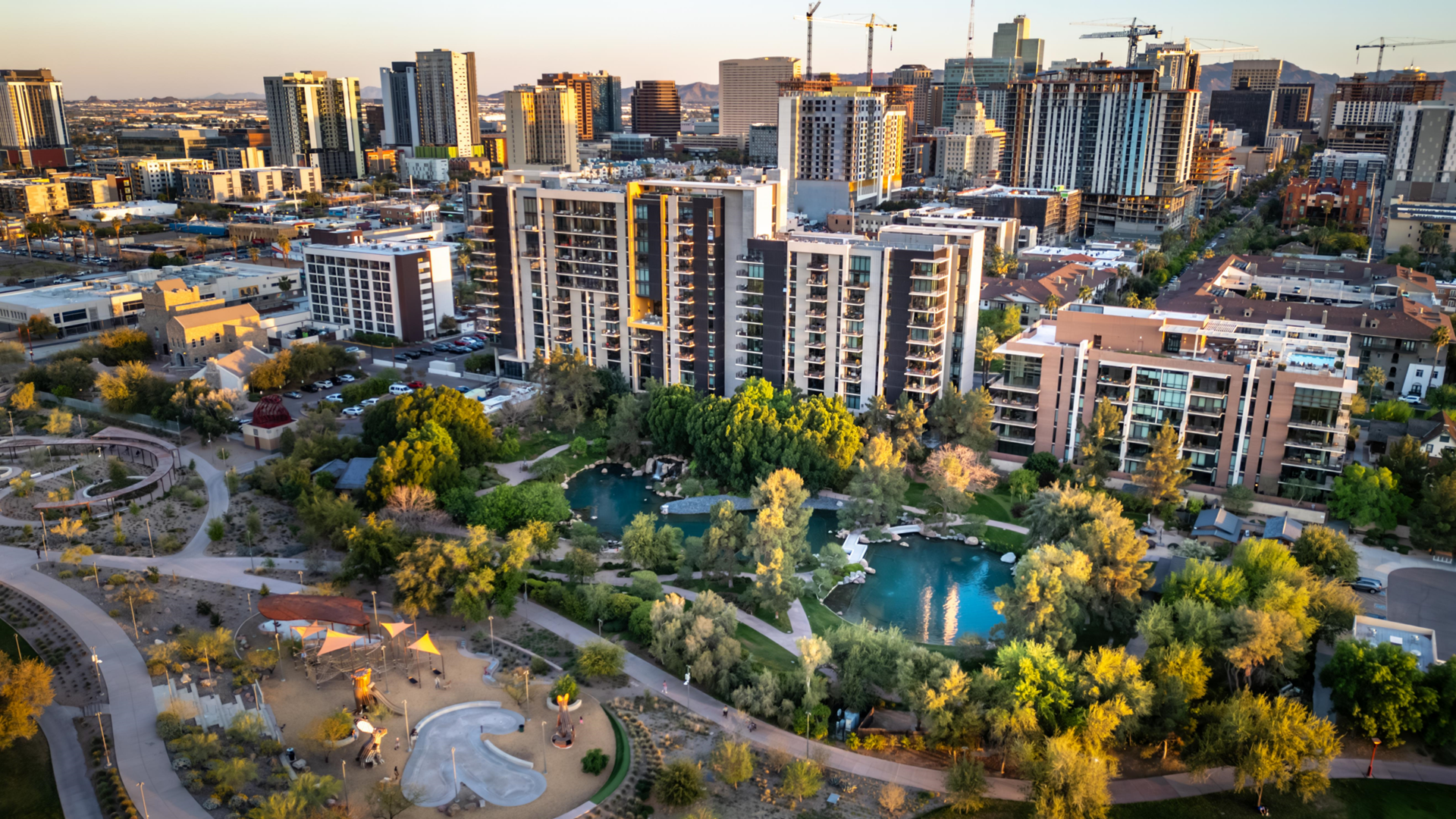 Aerial photo of a multi-family housing project and a park