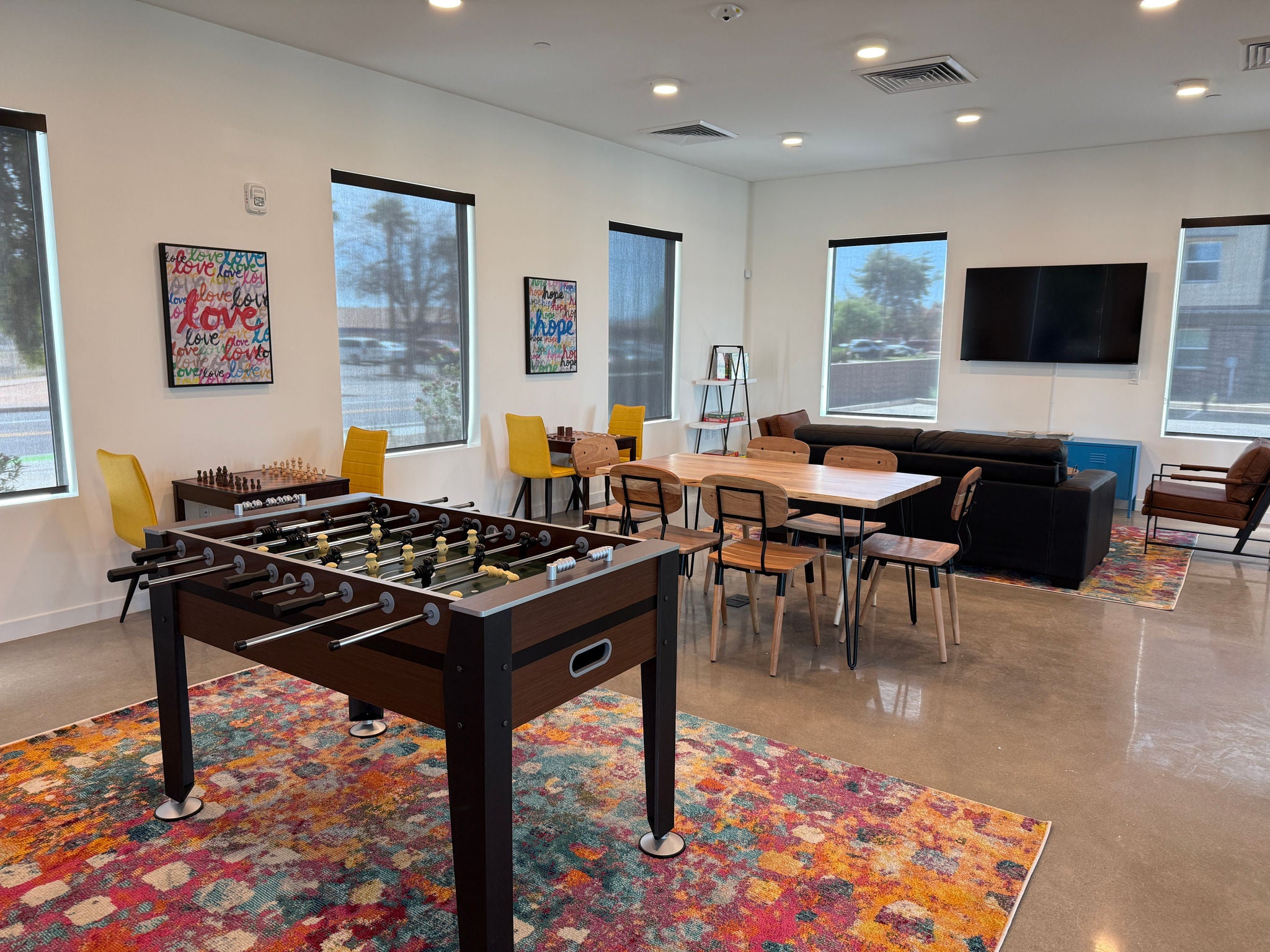 Community center game room at La Esperanza Terrace affordable housing community 