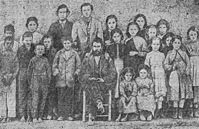 Photo of Phoenix's first school teacher, Jean Rudolph Darroche, surrounded by members of his 1871 class.