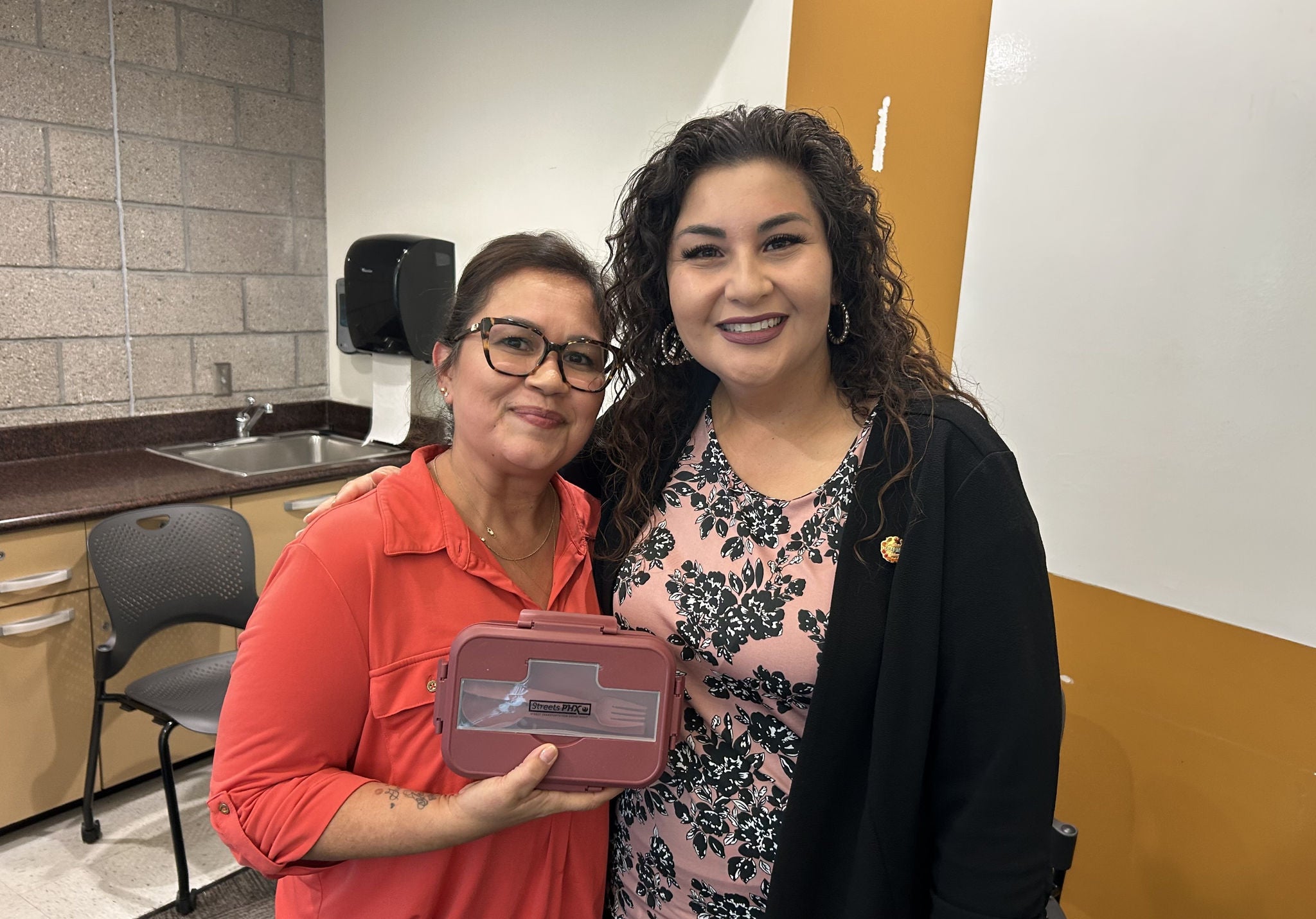 Briiana Velez handed out hats and bento boxes to Streets staff. 