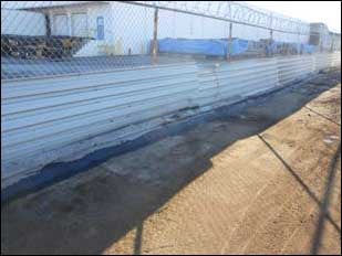 berm was constructed to prevent water from leaving site.